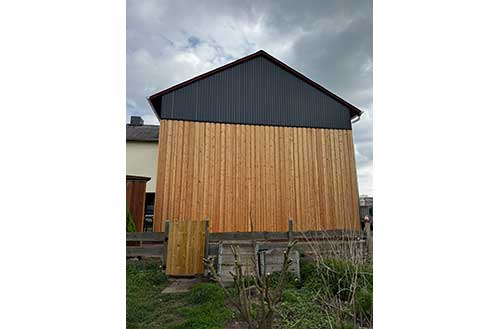 Fassadensanierung mit Sibirischer Lärche